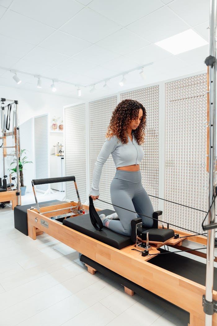 Woman on a Pilates Tower